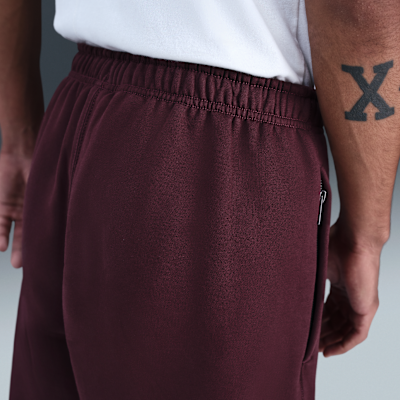 Pants de tejido Fleece con puños para hombre Nike Solo Swoosh