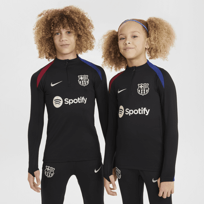 Fotbalové tréninkové tričko Nike Dri-FIT FC Barcelona Strike pro větší děti