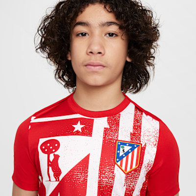 Atlético Madrid Academy Pro Home Older Kids' Nike Dri-FIT Football Pre-Match Short-Sleeve Top