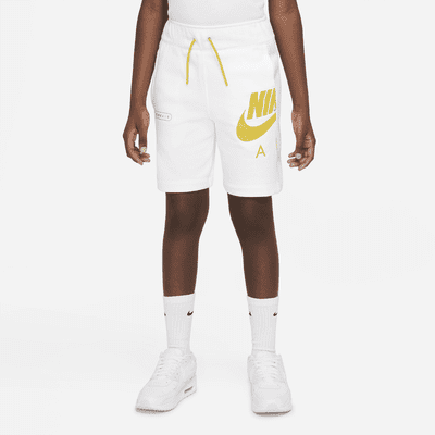 white and gold nike shorts