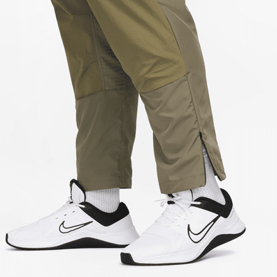 Nike A.P.S. Pants versátiles de tejido Woven Dri-FIT ADV para hombre