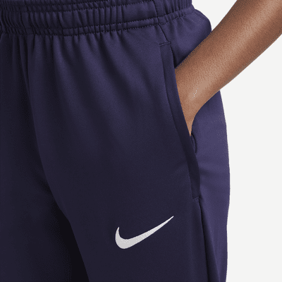 Maskinstrikkede England Strike Nike Dri-FIT-fodboldbukser til større børn