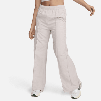 Pants de tiro medio con dobladillo abierto para mujer Nike Sportswear Everything Wovens