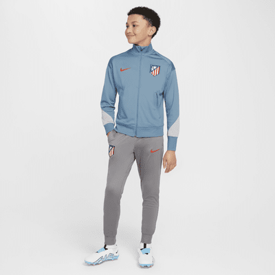 Atlético Madrid Strike Nike Dri-FIT strikket fotballtracksuit til store barn