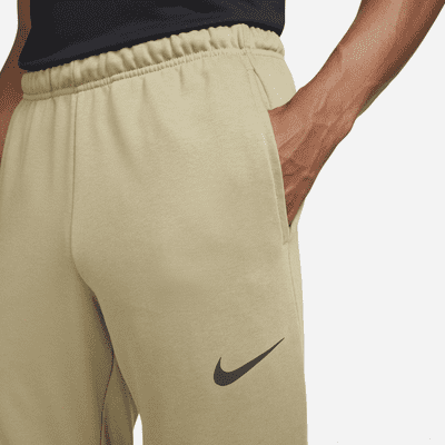 Nike Dry Dri-FIT toelopende fitnessbroek van fleece voor heren