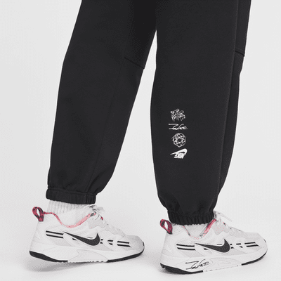 Nike Sportswear Breaking Pantalón oversize de talle medio y tejido French terry - Mujer