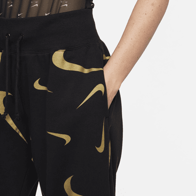 Joggers de tejido Fleece con estampado de tiro alto para mujer Nike Sportswear