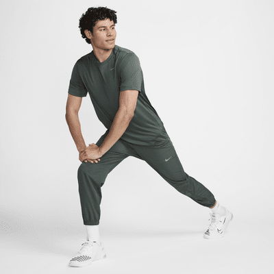 Pants Dri-FIT entallados versátiles para hombre Nike Form