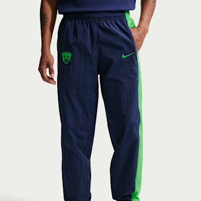 Pants deportivos de fútbol Nike Total 90 de tejido Woven para hombre Pumas UNAM Third