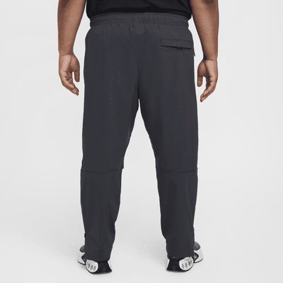 Pantaloni in tessuto Nike Tech – Uomo