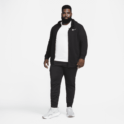 Träningsbyxor Nike Therma-FIT i avsmalnande modell för män