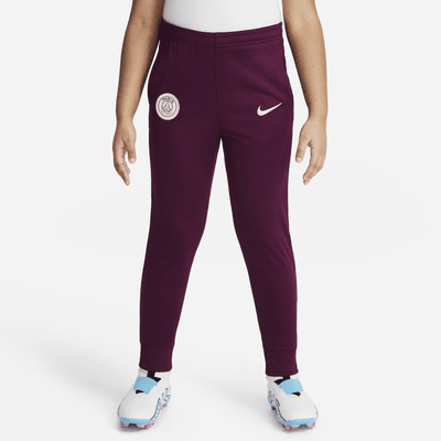 Paris Saint-Germain Strike Nike Dri-FIT strikket fotballtracksuit til små barn