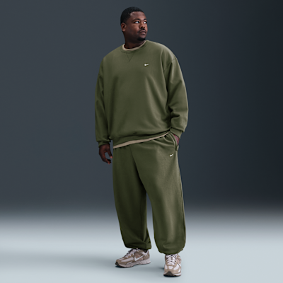 Pants de tejido Fleece con puños para hombre Nike Solo Swoosh