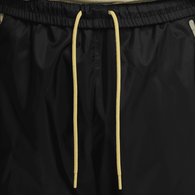 Pantaloni foderati in tessuto Nike Windrunner – Uomo