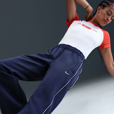 Pants de tejido Knit slim de tiro medio para mujer Nike Sportswear Windrunner