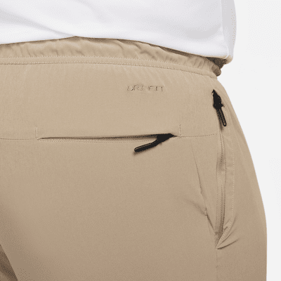 Pants versátiles Dri-FIT de pierna entallada para hombre Nike Unlimited