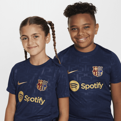 Předzápasové fotbalové tričko Nike Dri-FIT FC Barcelona Academy Pro pro větší děti s krátkým rukávem, domácí