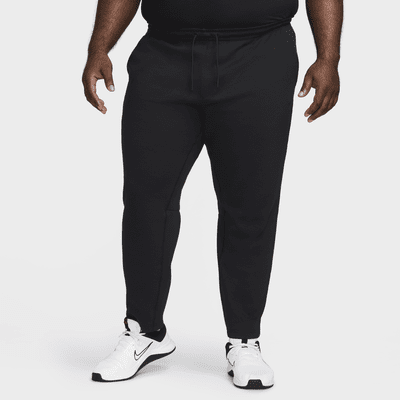 Pants Dri-FIT entallados versátiles con protección UV para hombre Nike Primary