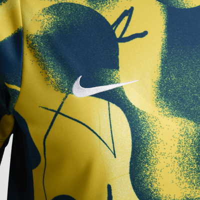 Playera de fútbol de manga corta Nike Dri-FIT para antes del partido para mujer Club América Academy Pro