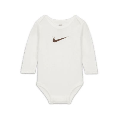 Pack de bodys para bebé Nike E1D1 3-Pack Bodysuits. Nike.com