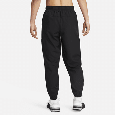 Nike Form Men's Dri-FIT Tapered Versatile Trousers. Nike IE