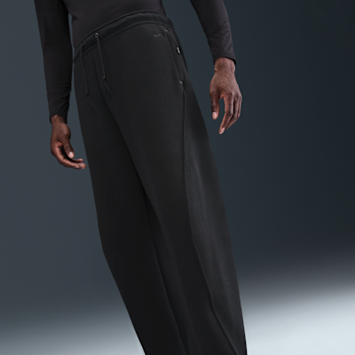 Pants de tejido Fleece de ajuste holgado con dobladillo abierto para hombre Nike Tech