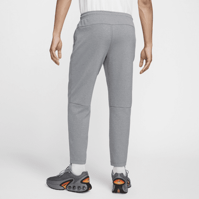 Pants Dri-FIT entallados versátiles con protección UV para hombre Nike Primary