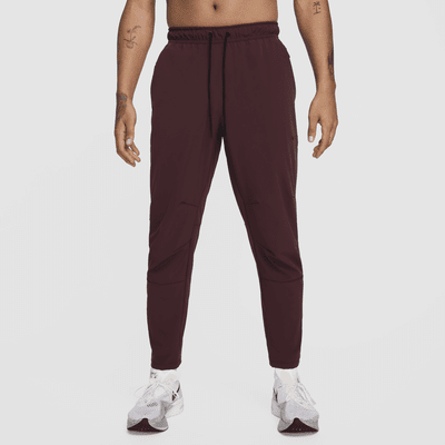 Pants versátiles Dri-FIT de pierna entallada para hombre Nike Unlimited