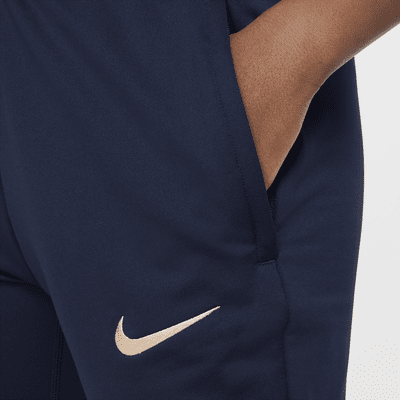 Pleteninové fotbalové kalhoty Nike Dri-FIT Chelsea FC Strike pro větší děti