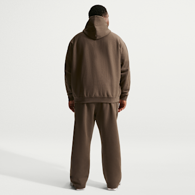 Pants de tejido Fleece con dobladillo abierto para hombre Nike Solo Swoosh