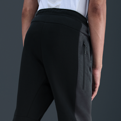 Pánské flísové kalhoty Nike Tech Color-Block s otevřeným lemem