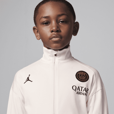 Paris Saint-Germain Strike (tredjedrakt) Jordan Dri-FIT strikket fotballtracksuit til små barn