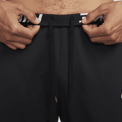 Pants de fitness con dobladillo abierto Therma-FIT para hombre Nike Therma