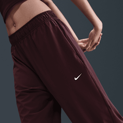 Pants de tejido Woven Repel de tiro alto para mujer Nike One