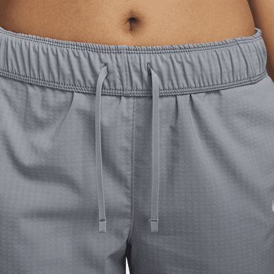 Pantaloni da running da riscaldamento a 7/8 a vita media Nike Dri-FIT Fast – Donna