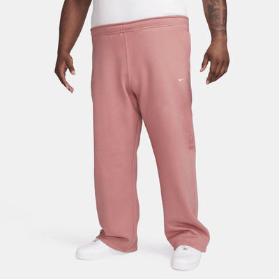 Pants de tejido Fleece con dobladillo abierto para hombre Nike Solo Swoosh