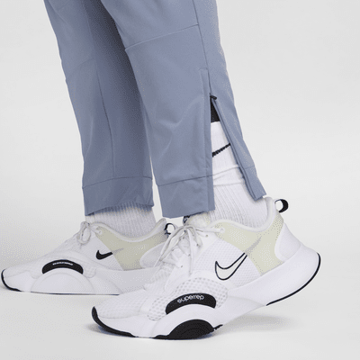 Nike Unlimited vielseitige Dri-FIT Hose mit Reißverschluss am Bündchen für Herren