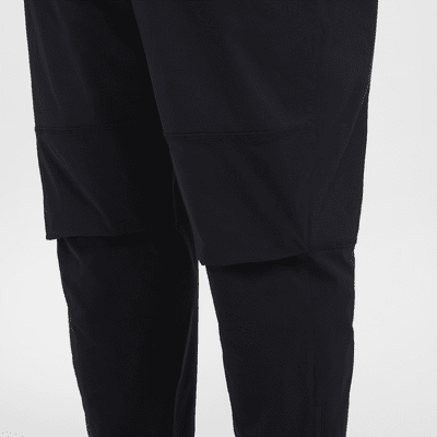 Pantaloni in tessuto Nike Tech – Uomo