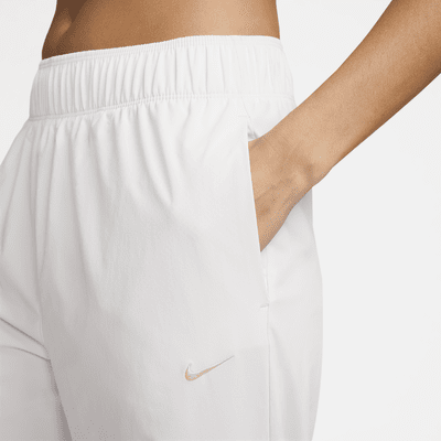 Pants de correr Dri-FIT de tiro medio de 7/8 para mujer Nike Fast