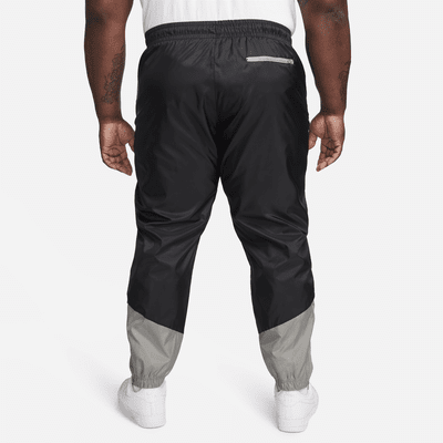 Pantaloni foderati in tessuto Nike Windrunner – Uomo