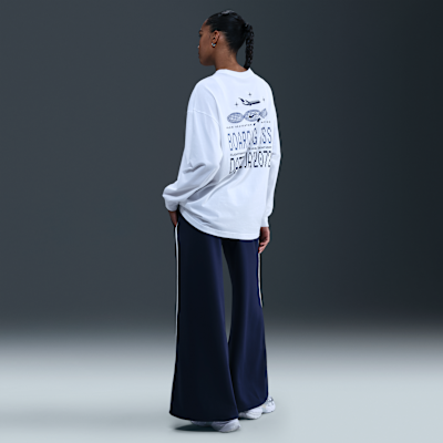 Pants de entrenamiento de tiro medio y pierna amplia para mujer Nike Sportswear