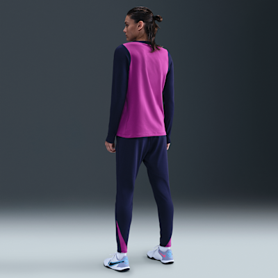 Camisola de futebol de gola redonda em malha Nike Dri-FIT Strike FC Barcelona para mulher