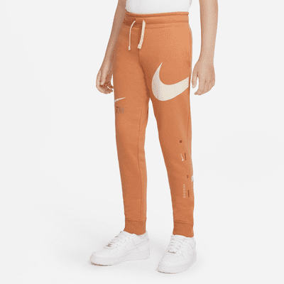 Pantaloni in fleece Nike Sportswear Swoosh - Ragazzo. Nike IT