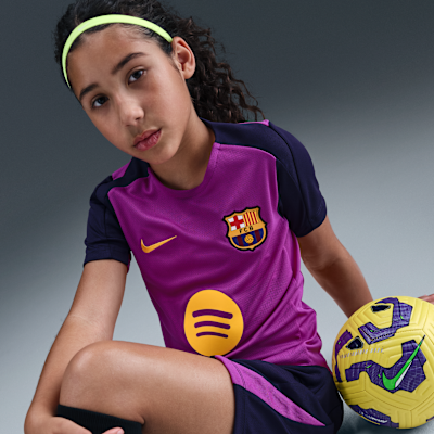 Koszulka piłkarska z krótkim rękawem dla dużych dzieci Nike Dri-FIT FC Barcelona Strike