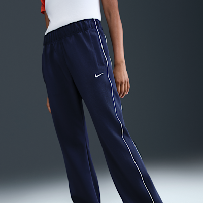 Pants de tejido Knit slim de tiro medio para mujer Nike Sportswear Windrunner