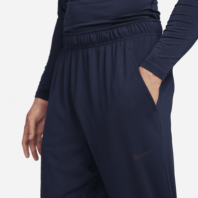 Pants Dri-FIT versátiles con dobladillo abierto para hombre Nike Totality