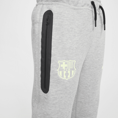 FC Barcelona Tech Fleece Nike Soccer nadrág nagyobb gyerekeknek (fiúknak)