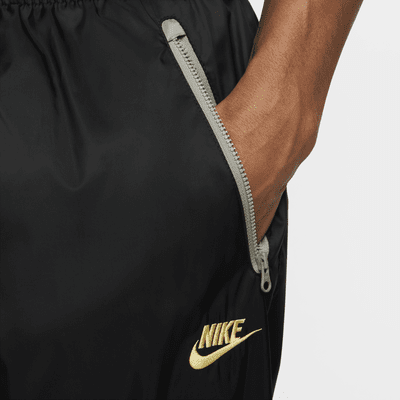 Pantalon doublé en tissu tissé Nike Windrunner pour homme