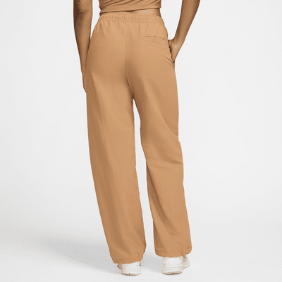 Pants de tiro medio con dobladillo abierto para mujer Nike Sportswear Everything Wovens