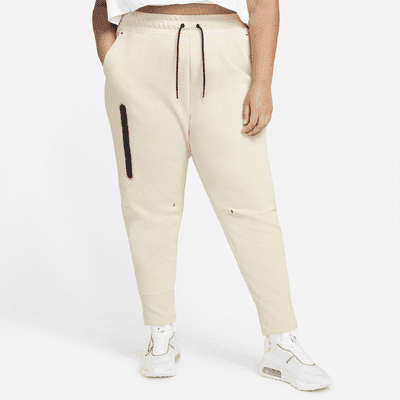 nike tech pants beige